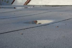 what-to-put-on-flat-roof-stop-leaks